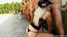 Play Two teenage girls fucked in public with a group of men